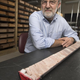 Lead author Dennis Kent with part of a 1,700-foot-long rock core extracted from the Chinle Formation in Petrified Forest National Park in Arizona.